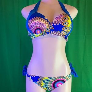 Women’s swimsuit blue, yellow and pink with bird feather print